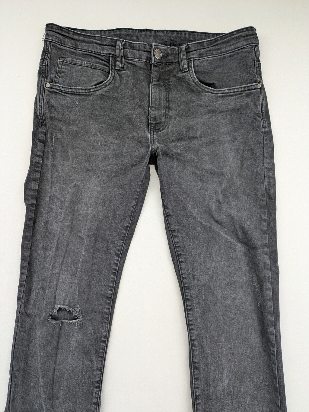 Denim 1982 grey slim fit jeans with ripped knee detail and distressed finish.