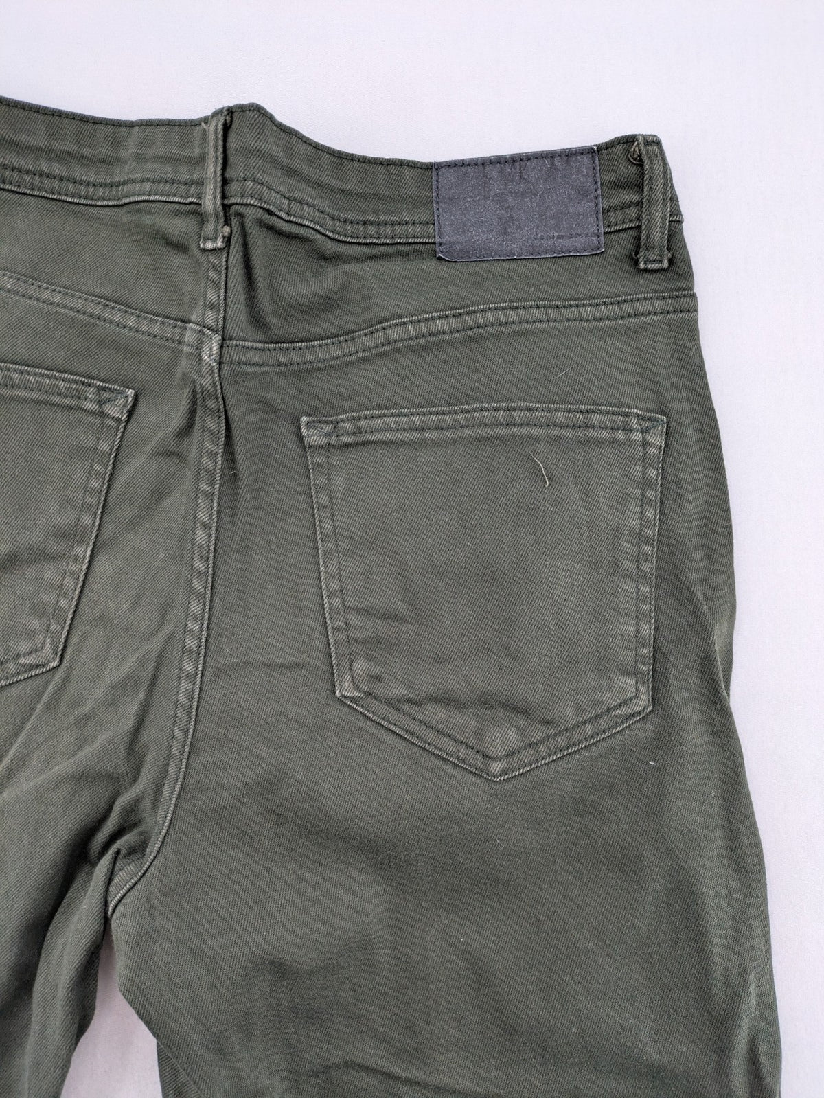 Denim & Co. green straight jeans 5-pocket design, cotton-stretch material.