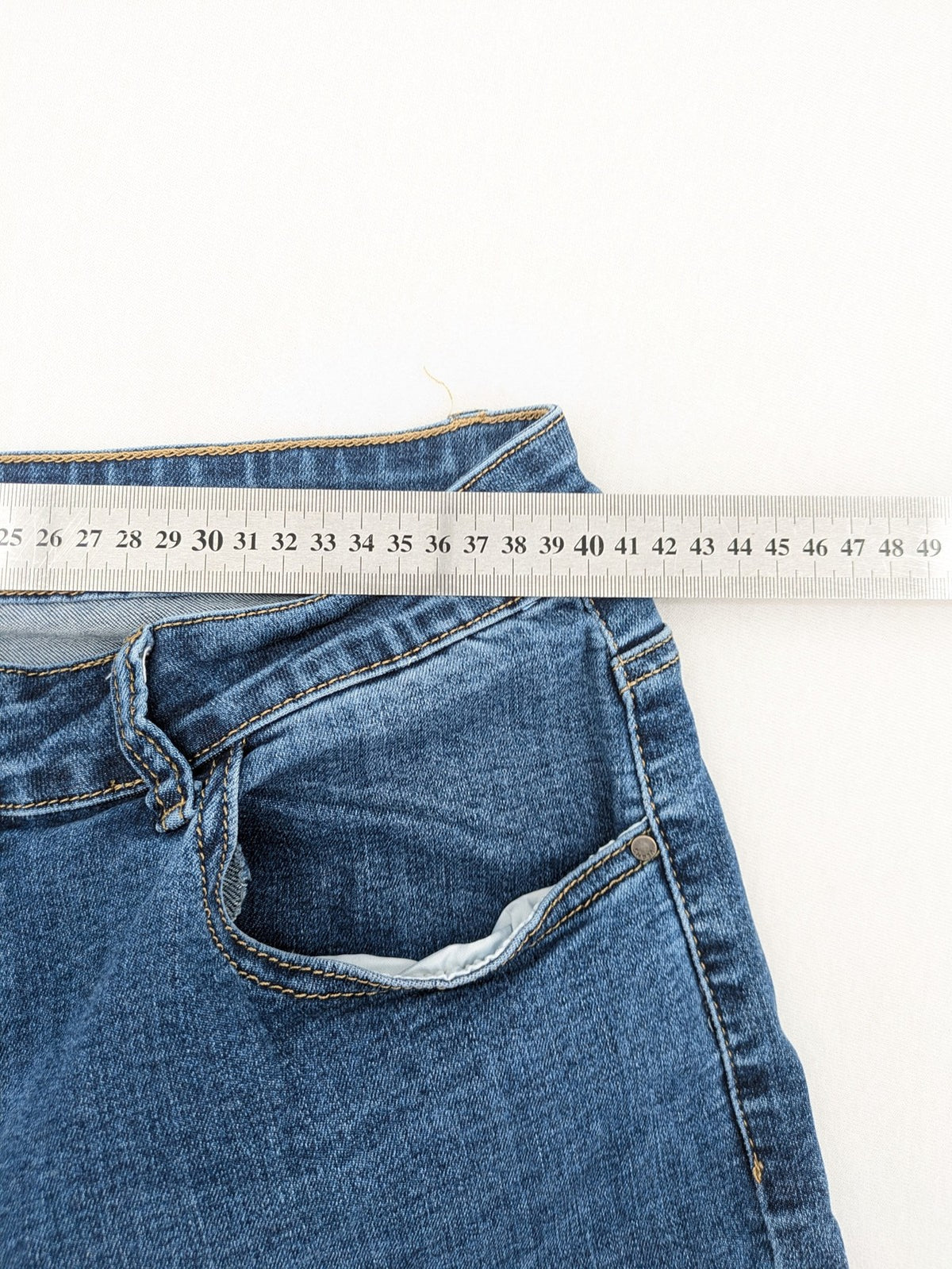 Obiettivo blue bootcut jeans 5-pocket design, comfortable stretch denim, classic medium wash.
