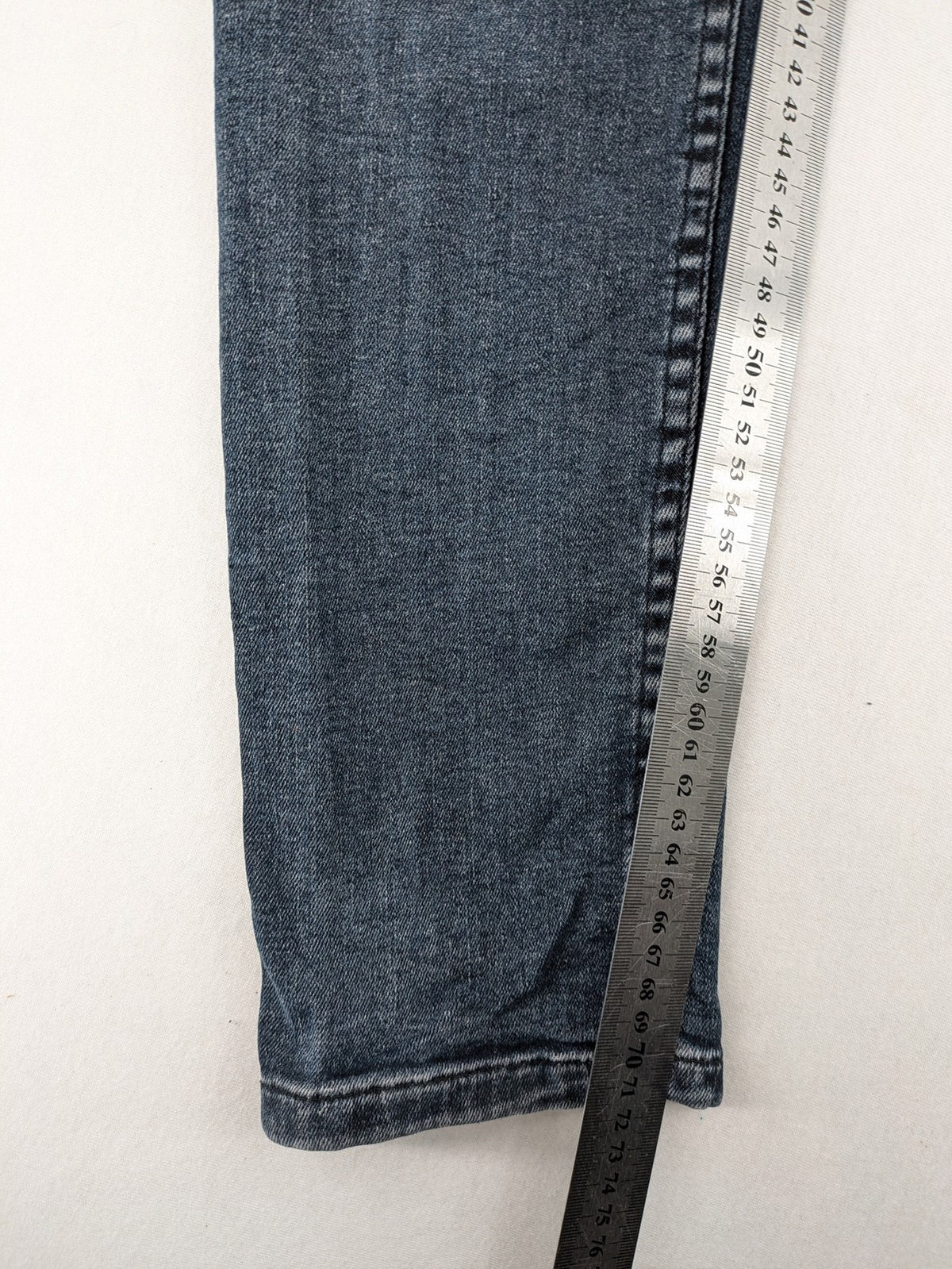 Zara blue slim fit jeans with classic 5-pocket design and subtle wash effect.