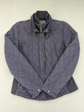 Massimo Dutti black quilted jacket with contrasting brown trim and ribbed side inserts.