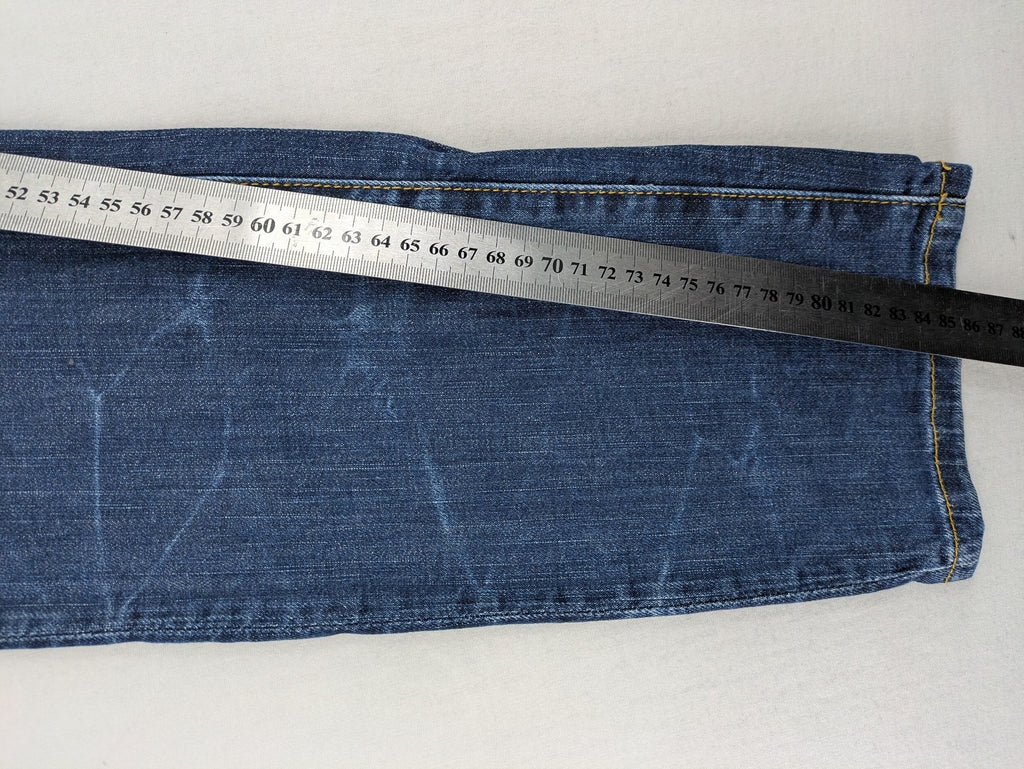 QS by s.Oliver green straight jeans five-pocket design with unique double button closure