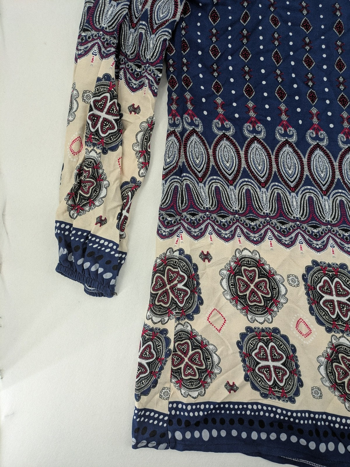 Uğurlar Collection multi tunic dress with vibrant Boho-Ethno pattern and V-neck tassel detail.