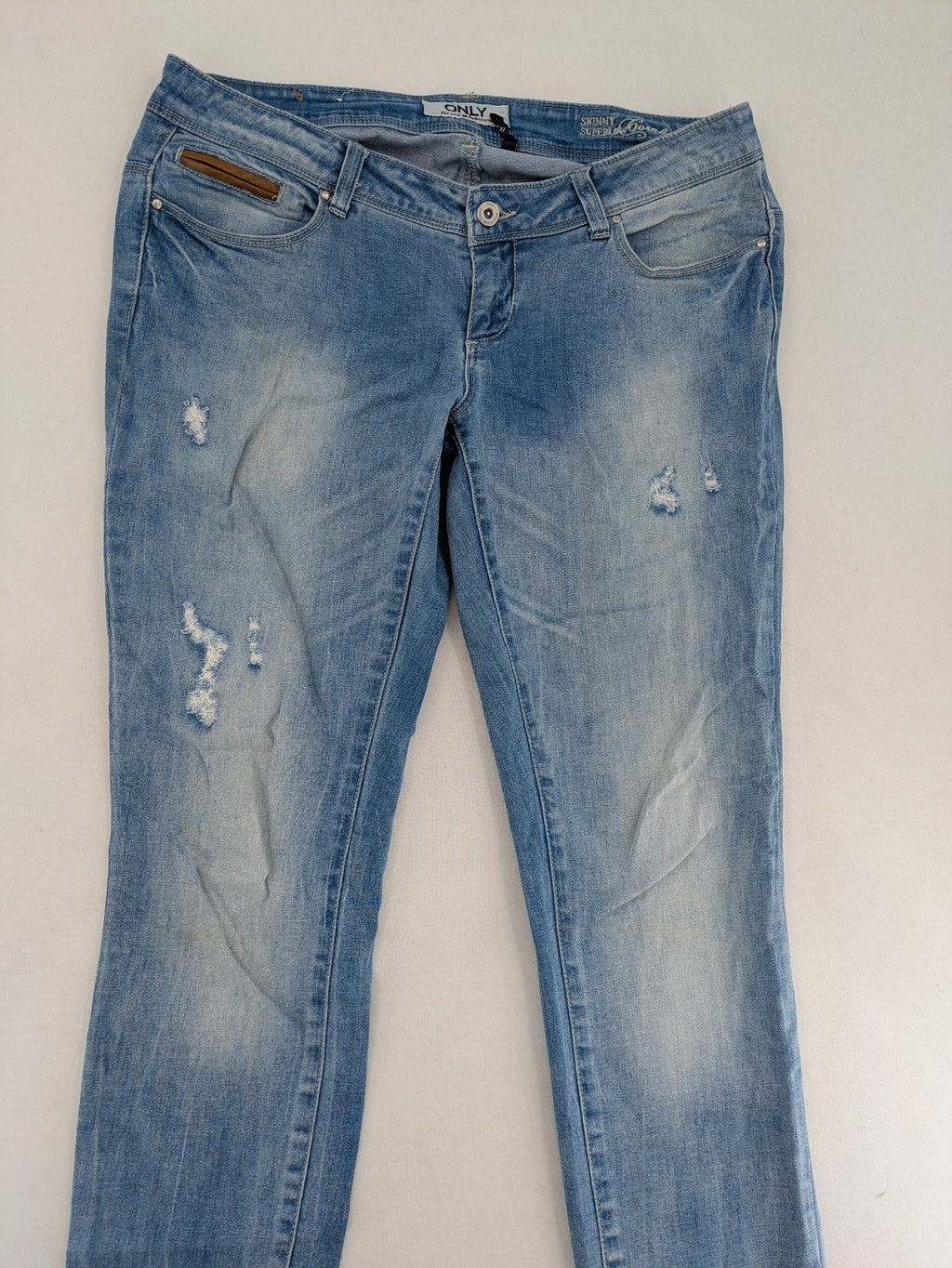 ONLY skinny jeans superlow coral orange pink distressed denim with modern used-look details.