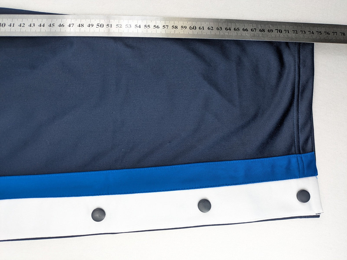 McORVIS blue tearaway training pants with side snap buttons and elastic waistband.