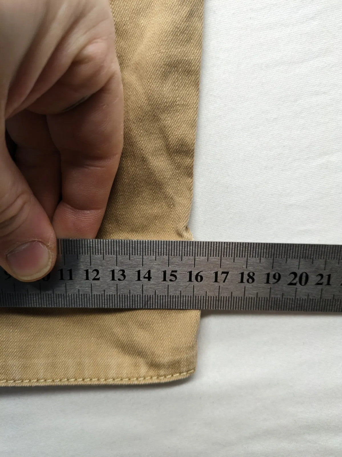 H&M beige tapered leg pants with pleats, high waist, 100% cotton, side pockets.