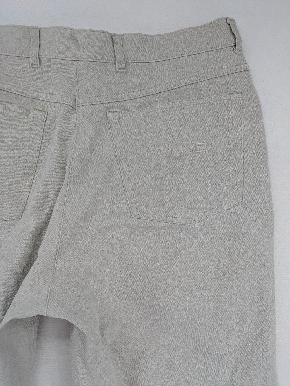 Vunic beige chinos with straight leg, 5-pocket design, and classic front zipper closure.