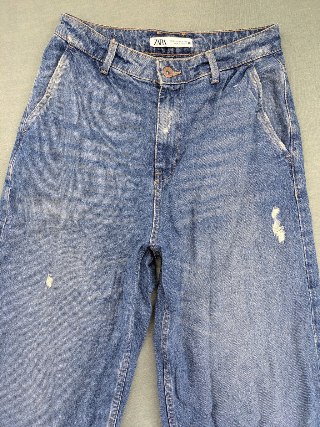 Zara blue wide leg jeans high rise with distressed details and 5-pocket design.