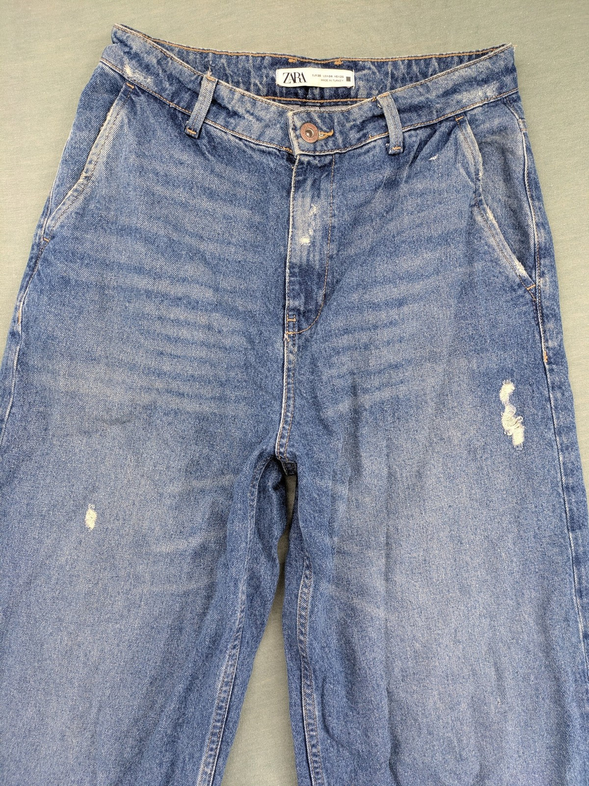 Zara blue wide leg jeans high rise with distressed details and 5-pocket design.
