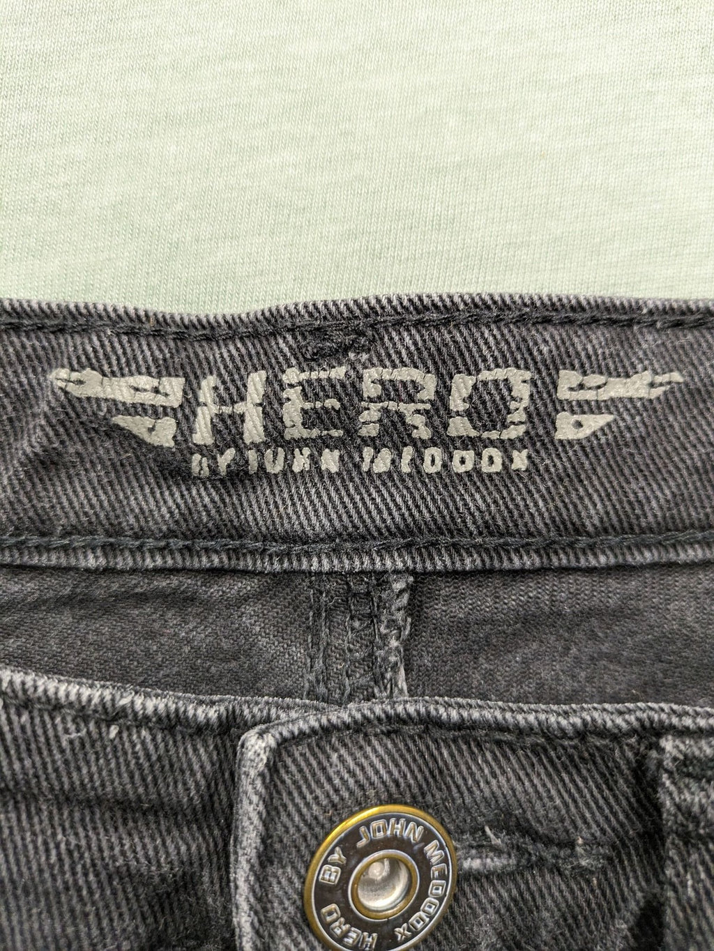 Hero by John Meddox black straight jeans with faded wash and durable cotton-stretch material.