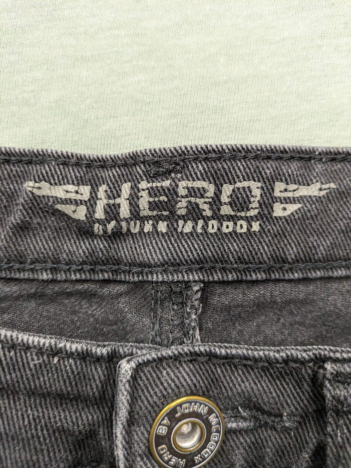 Hero by John Meddox black straight jeans with faded wash and durable cotton-stretch material.