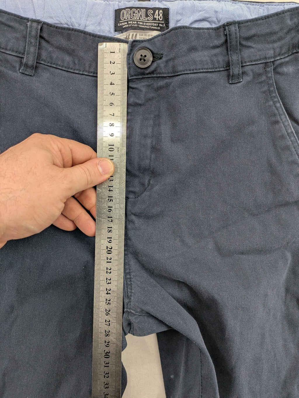 H&M navy chino pants with stretch, classic design, soft cotton blend material.