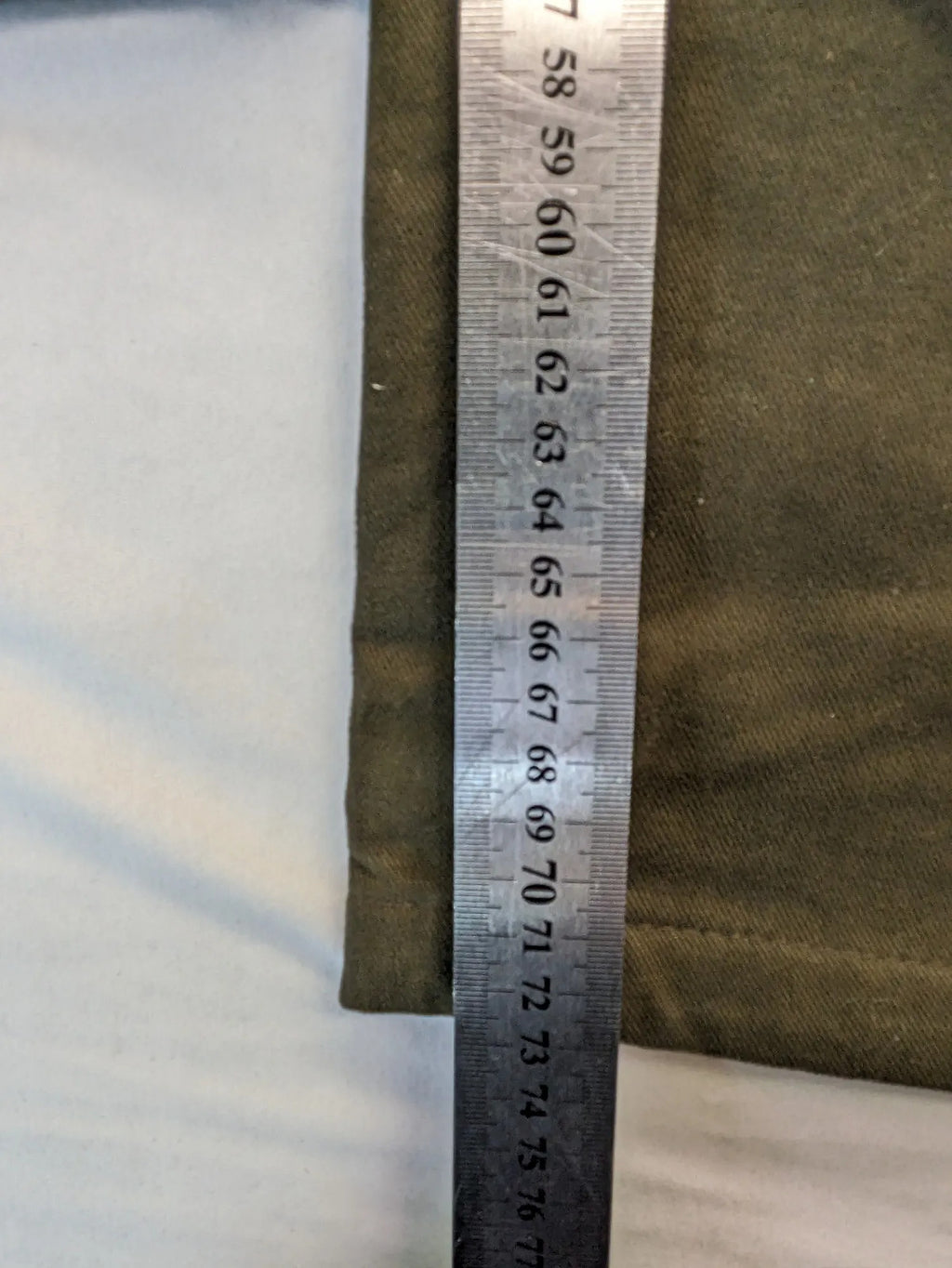 Lands' End green cargo pants with plaid flannel lining and traditional fit design.