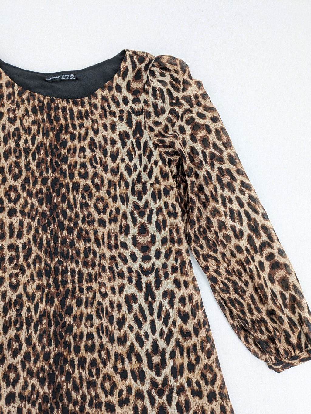 Atmosphere beige leopard print dress with sheer chiffon sleeves and buttoned cuffs.