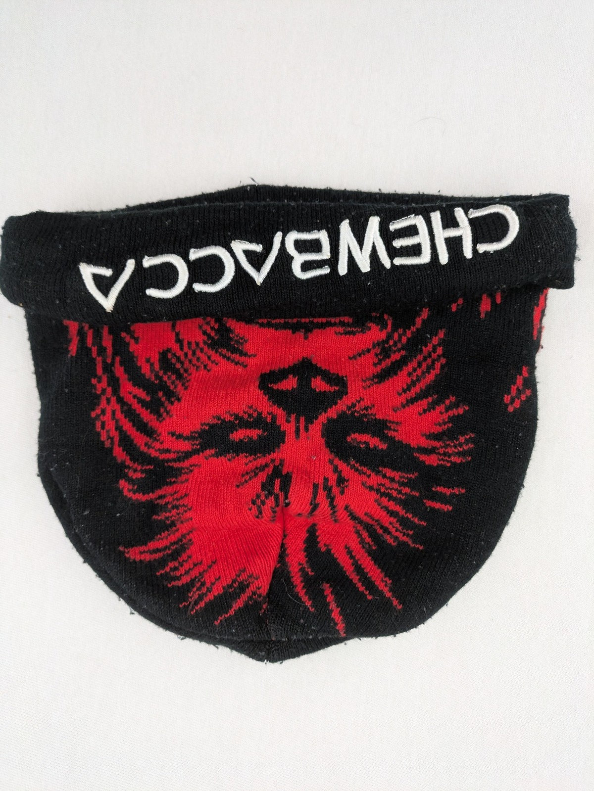 Star Wars black and red reversible beanie featuring Chewbacca graphic and logo.