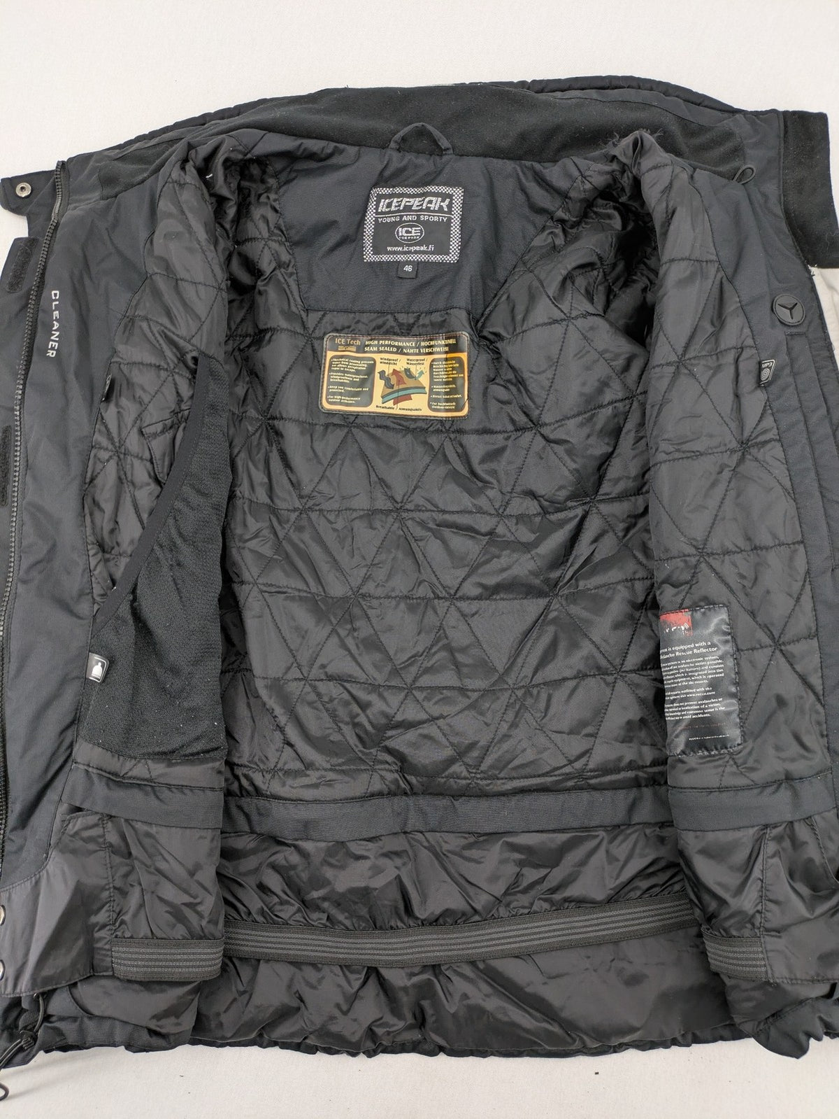 Icepeak black and white ski snowboard jacket with RECCO logo and quilted insulation.
