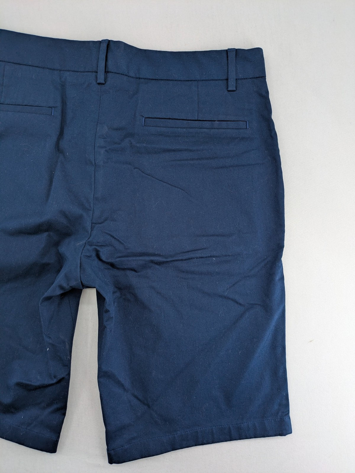Spoke navy chino shorts flat front with unique printed pocket lining.