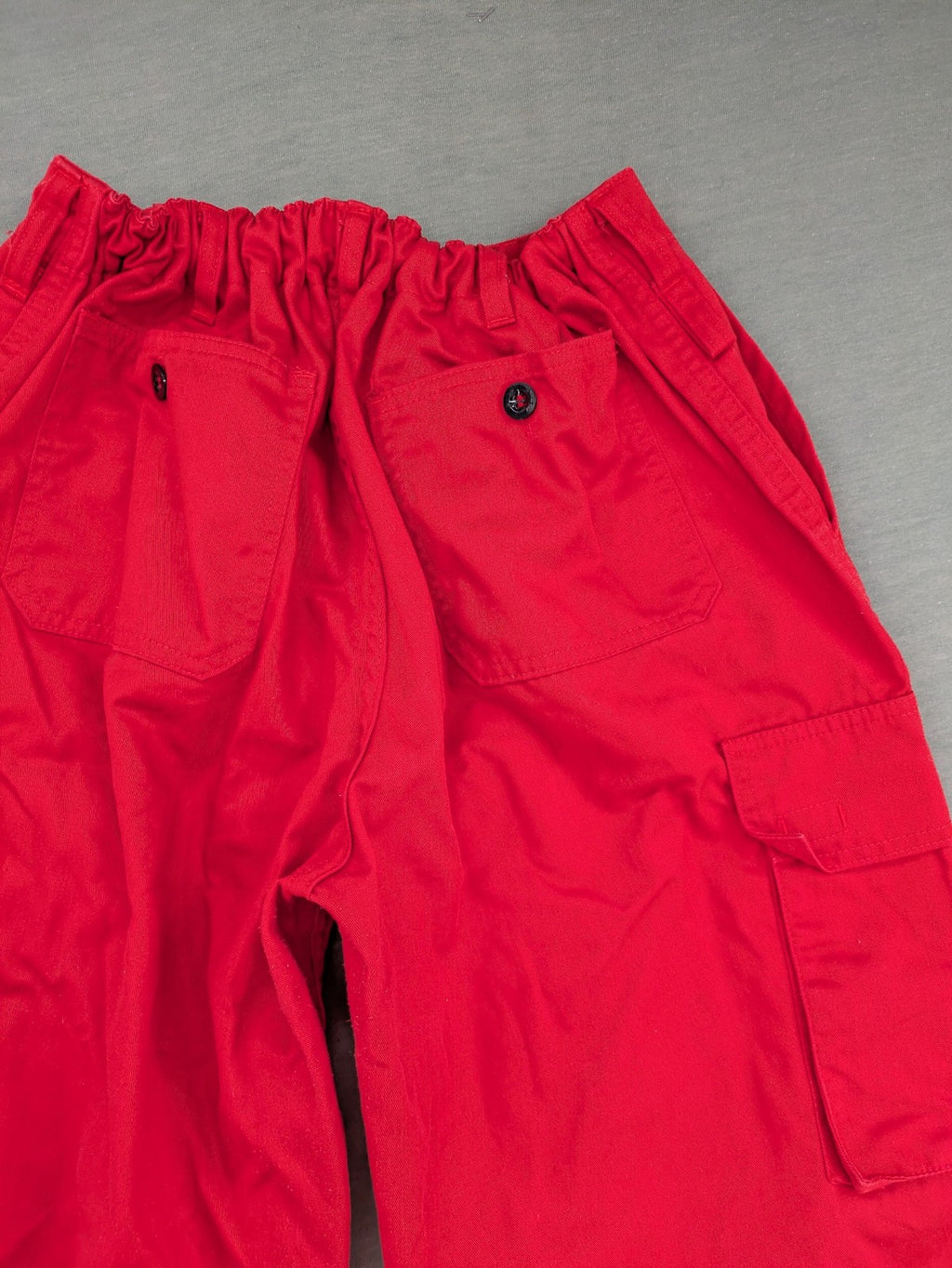Bücking grey cargo work pants red accents with 3M Scotchlite reflective strips.