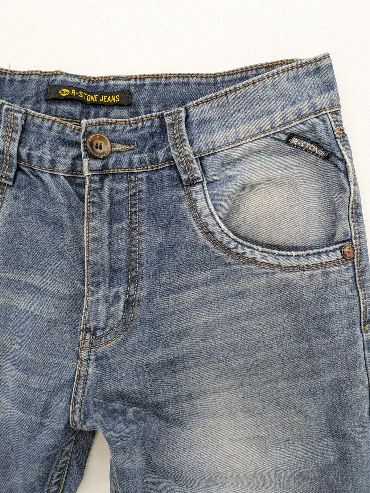 R-Stone Jeans blue straight leg denim with washed effect and "Fashion Wear" embroidery.
