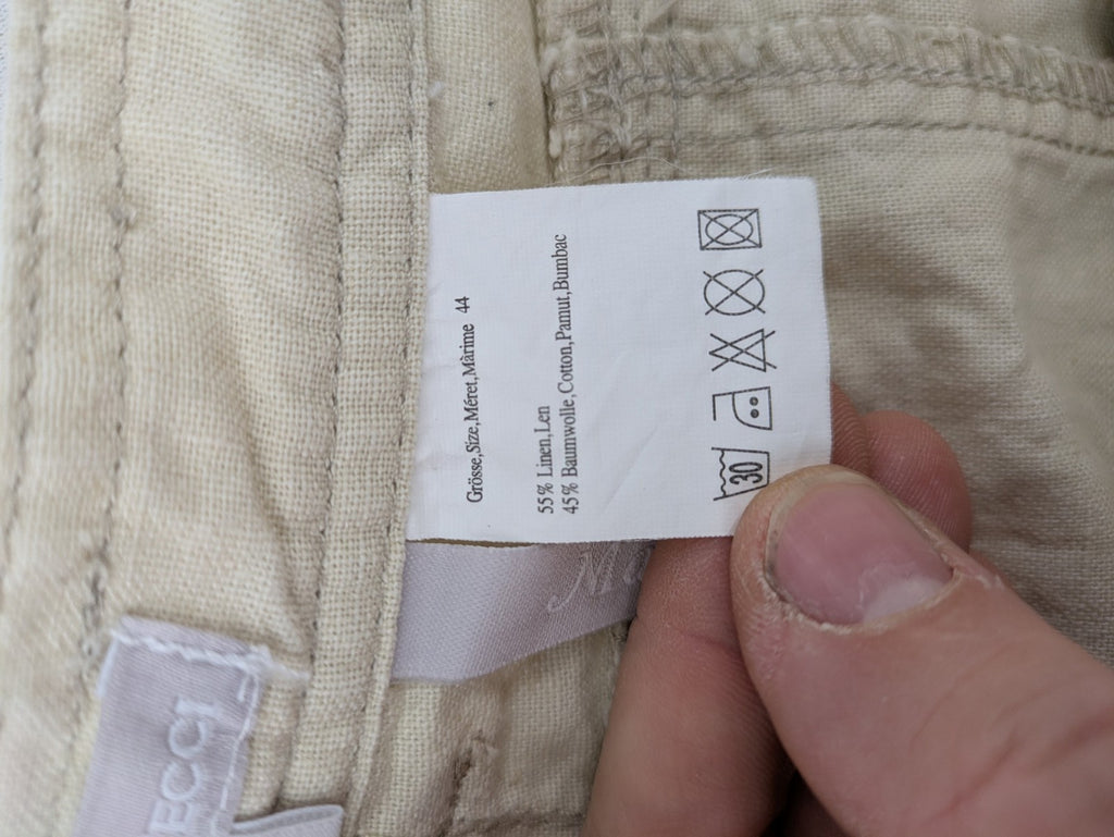 Marco Pecci beige capri pants with prominent seam details and practical pockets.