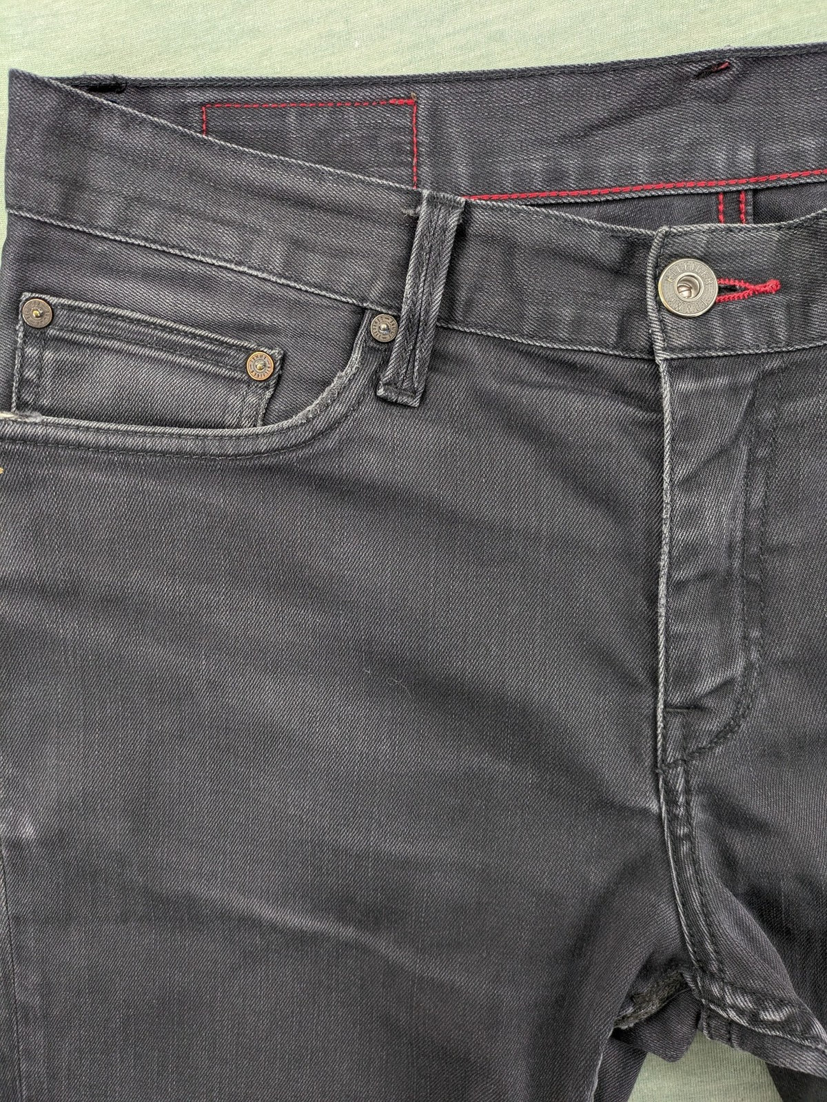 Tommy Hilfiger grey straight jeans faded denim with iconic logo detail.