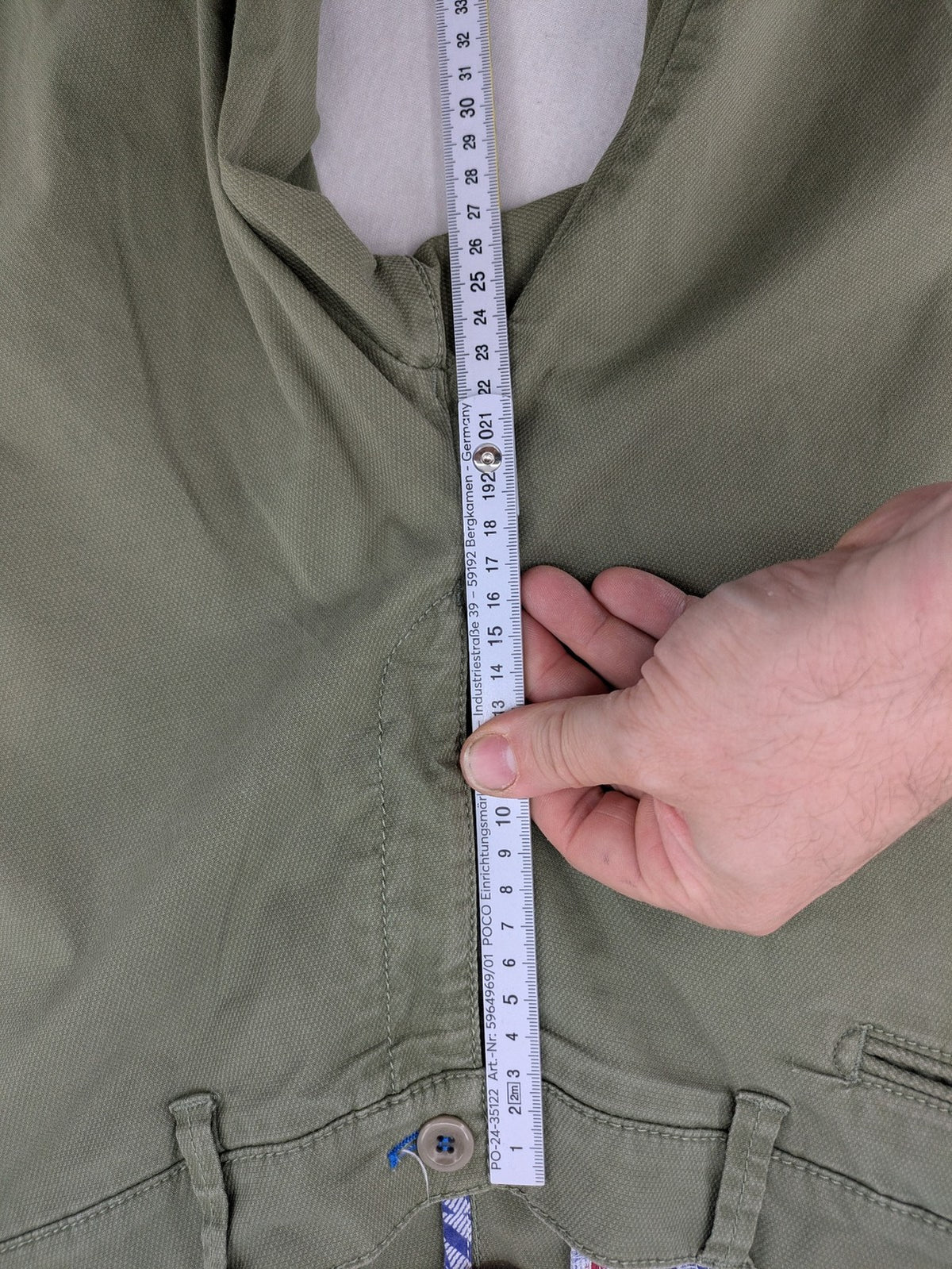 BRAX green chino pants flat-front design with zipper and buttoned back pockets.