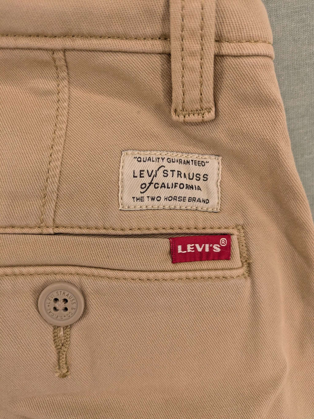 Levi's beige XX Chino pants slim taper fit with classic logo and quality fabric.