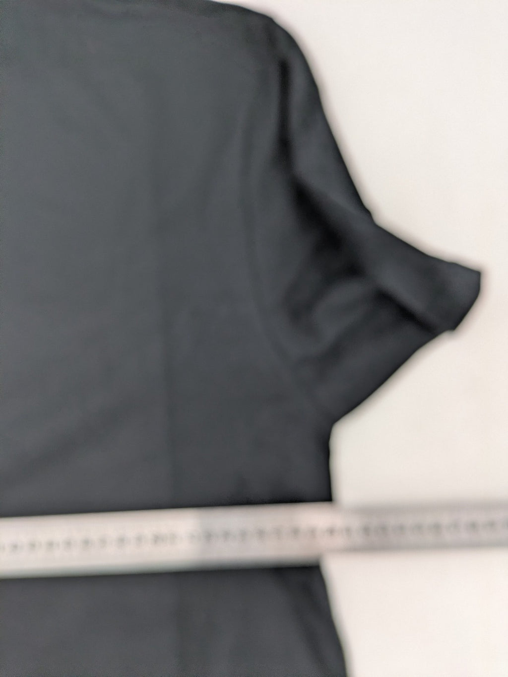 Dragon Ball Z blue graphic t-shirt featuring Goku Sport text and soft cotton material.