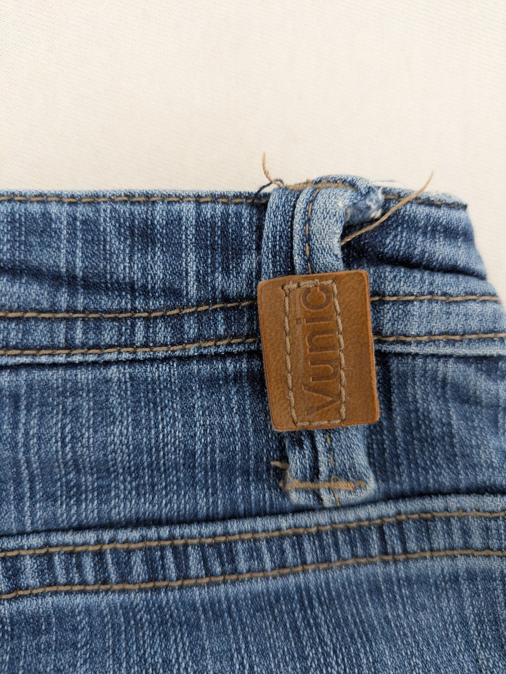 Vunic blue bootcut jeans medium wash five-pocket style with zipper and button closure