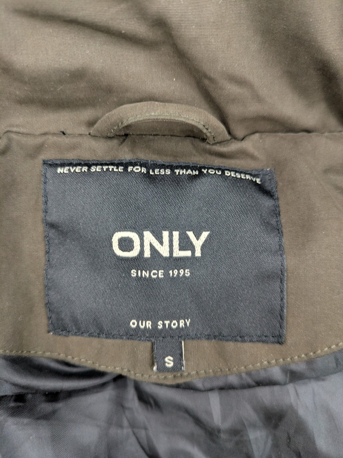 ONLY khaki parka coat with hood, quilted lining, and ribbed cuffs.