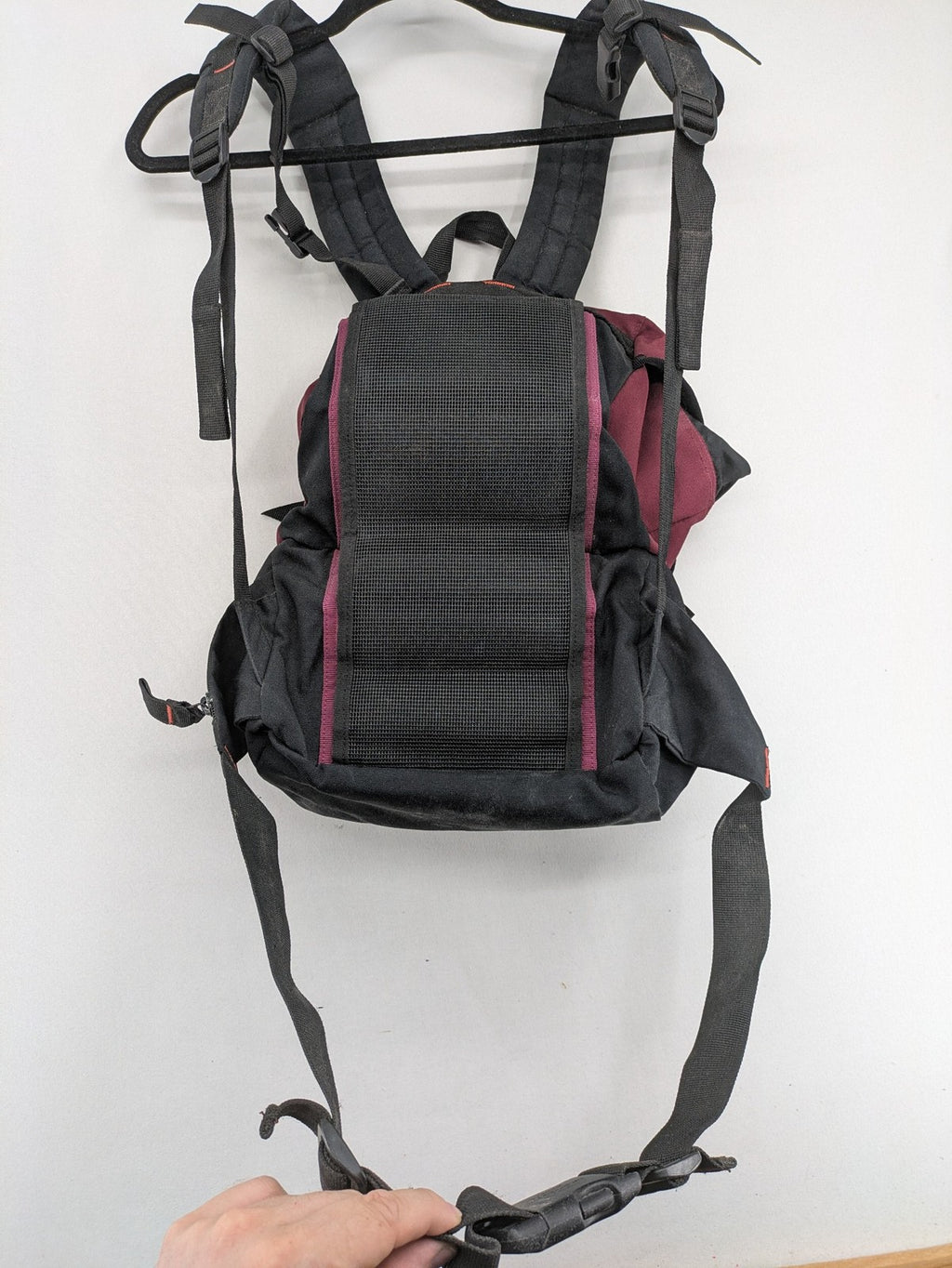 Adidas burgundy vintage rucksack with logo, Teflon fabric, and drawstring closure.