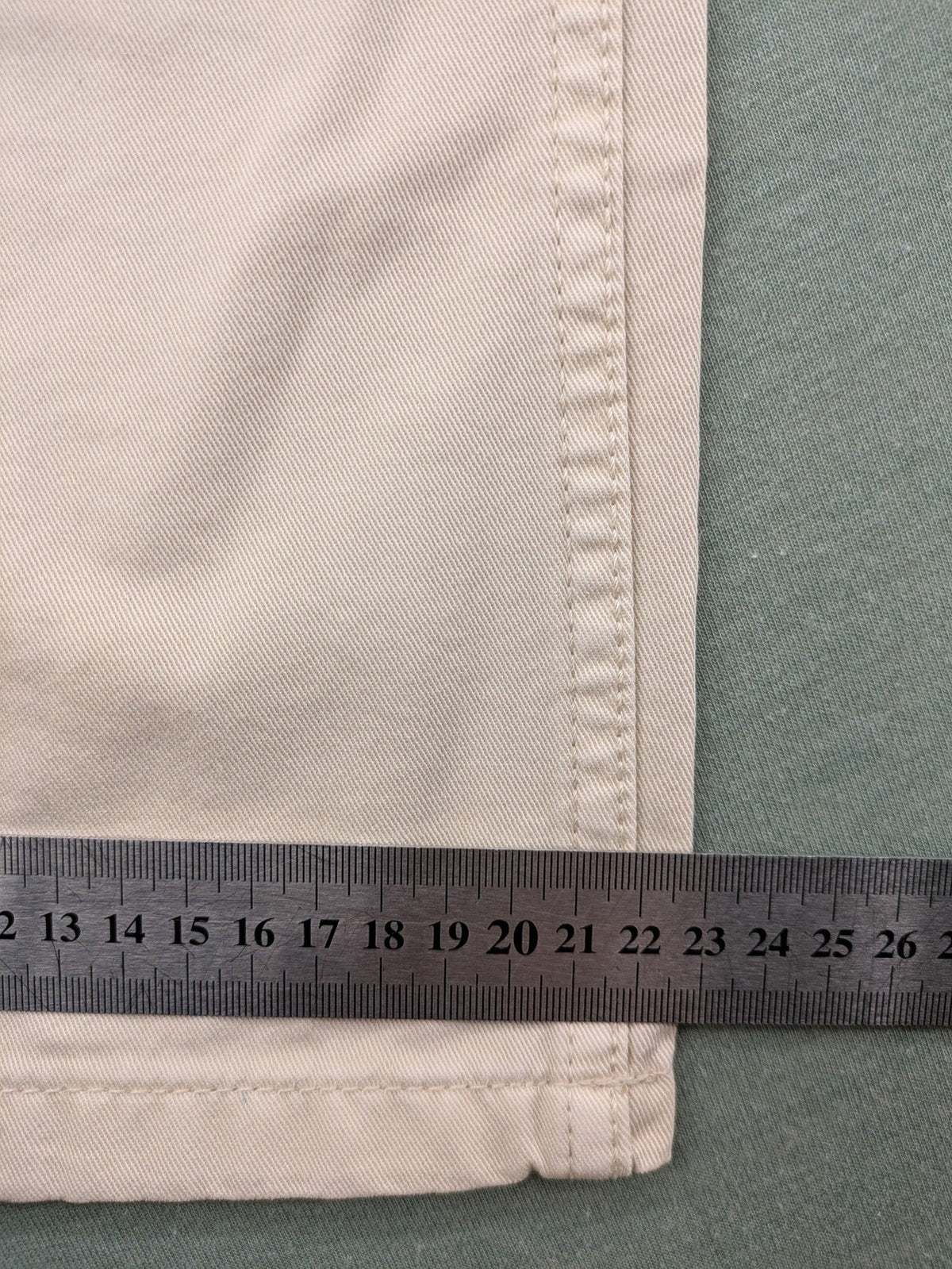 MNG beige cargo pants with straight leg, button closure, and patch pockets.