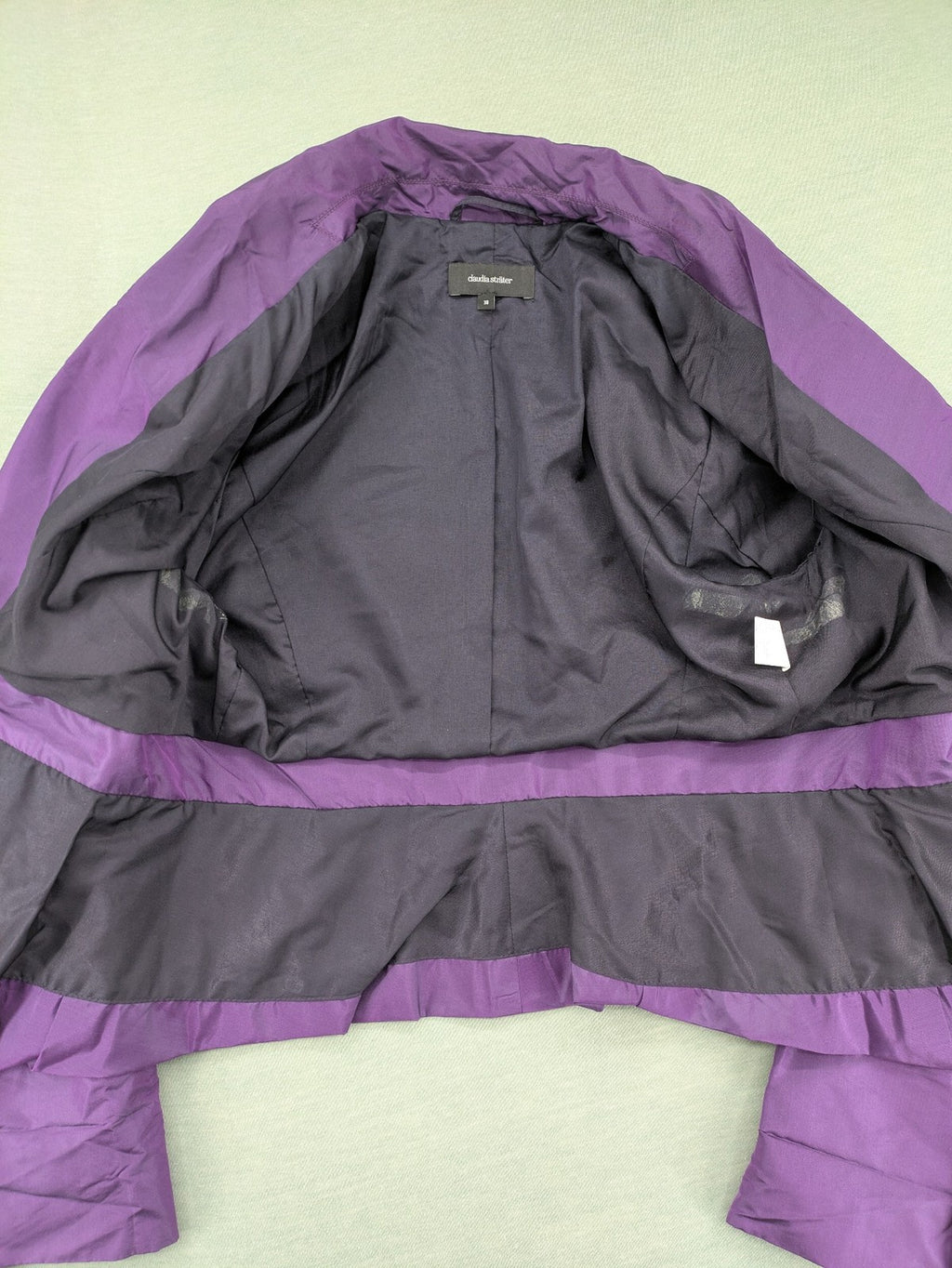 Claudia Sträter purple silk blazer with shawl collar and belt detail.