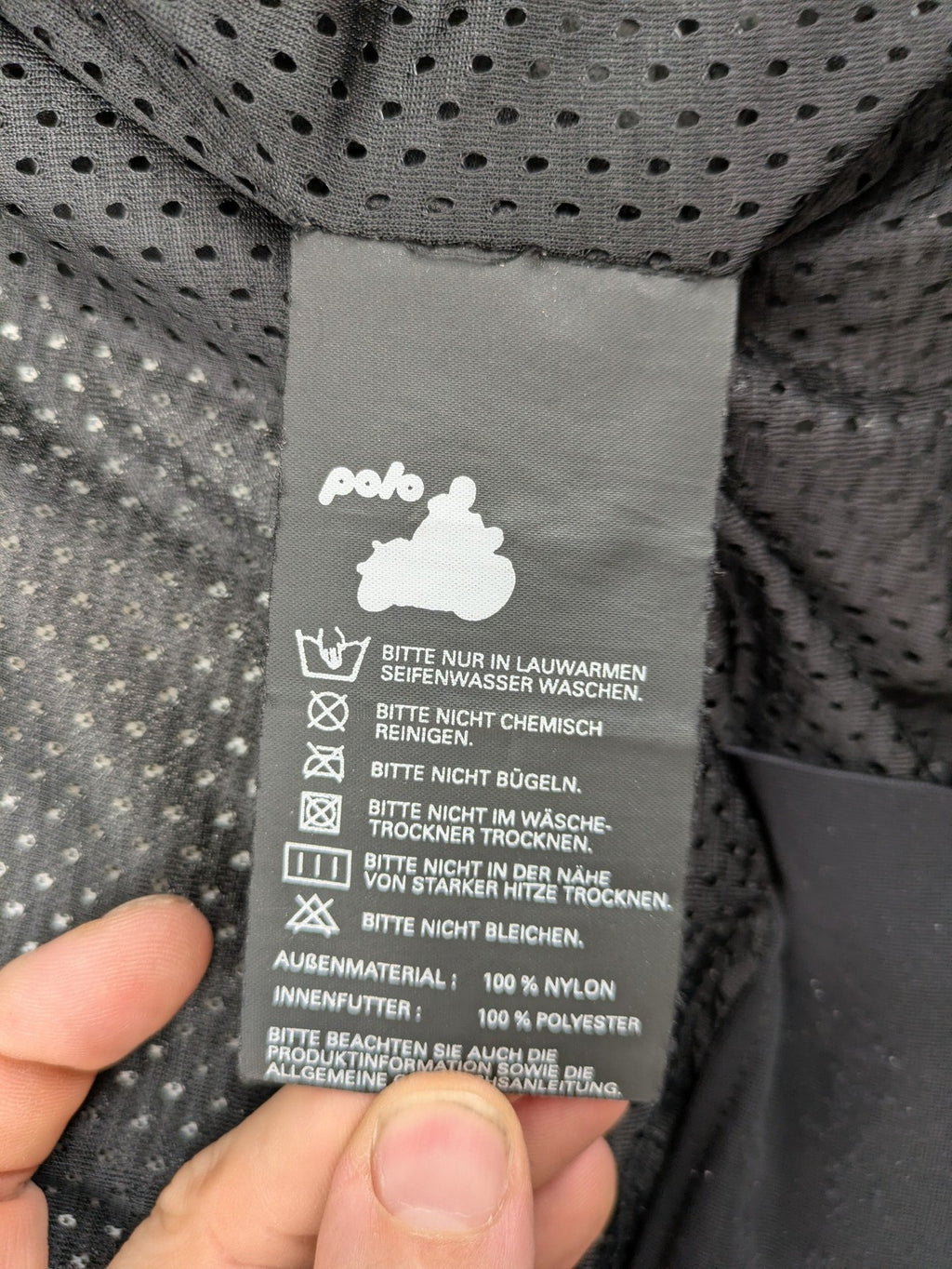 Polo multi biker jacket nylon with adjustable fit and multiple pockets.