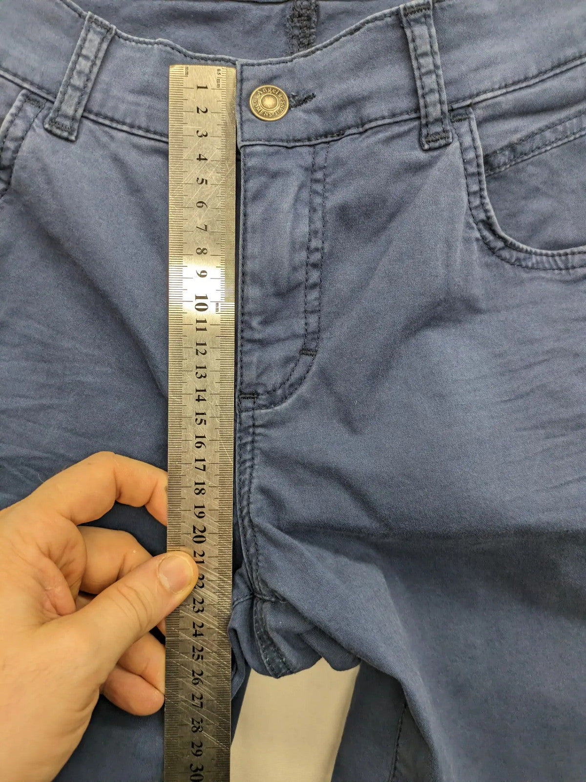 Angels blue straight jeans with five-pocket design and vertical front seams.