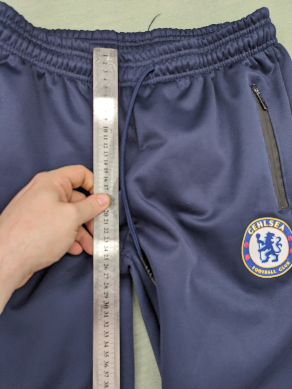Chelsea FC grey and navy tracksuit set with full zip hoodie and three logos.