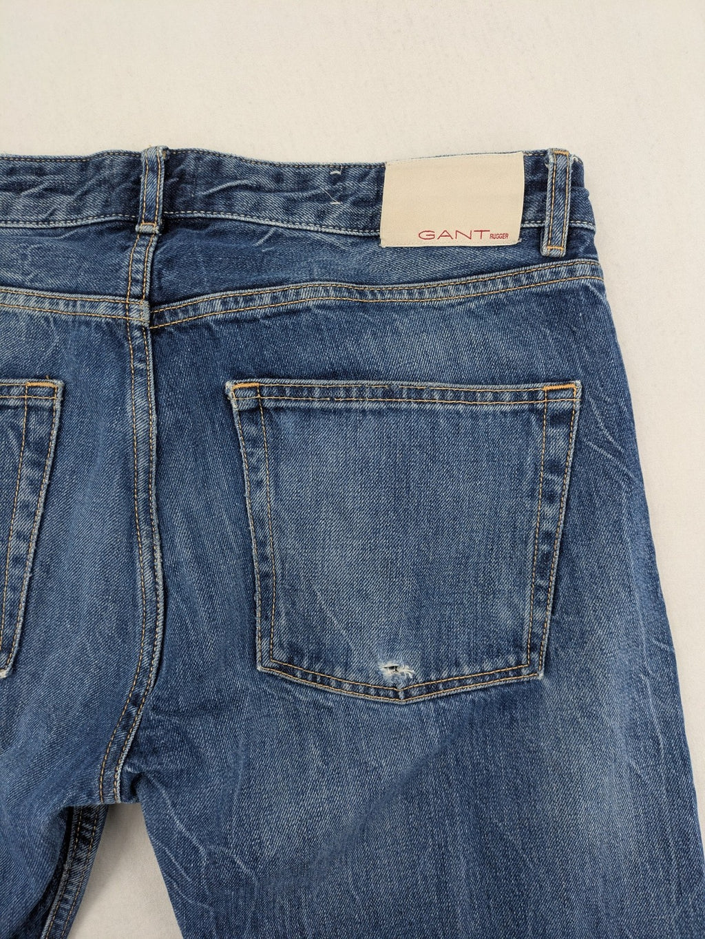GANT Rugger blue straight leg jeans medium wash, classic button fly, durable cotton denim.