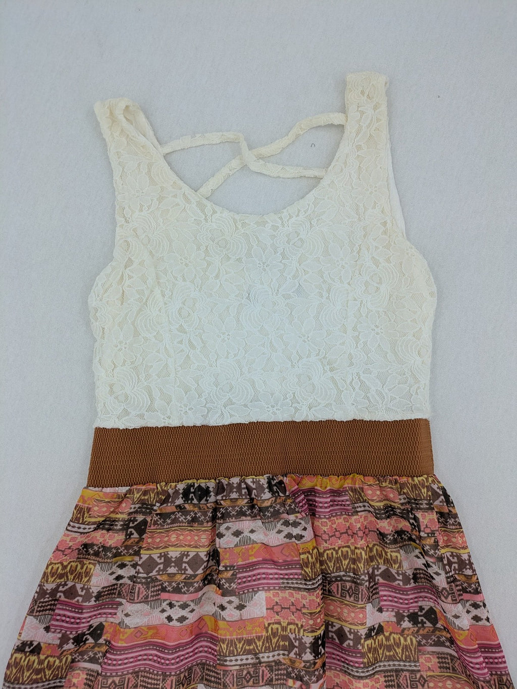 Boho multi summer dress white lace bodice with crossed straps and high-low hem.