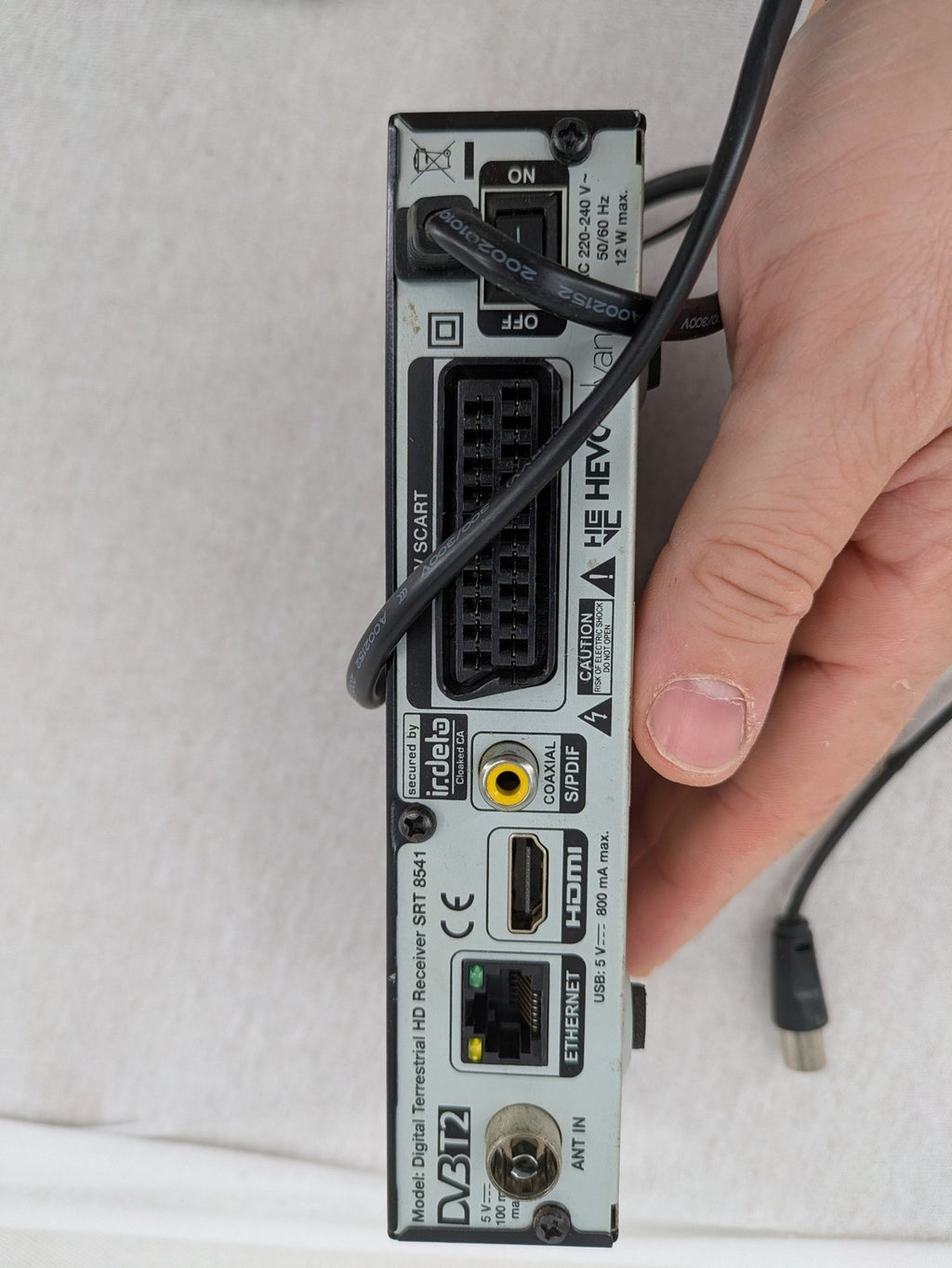 Strong satellite receiver black with logo, HDMI and SCART ports, complete antenna set.