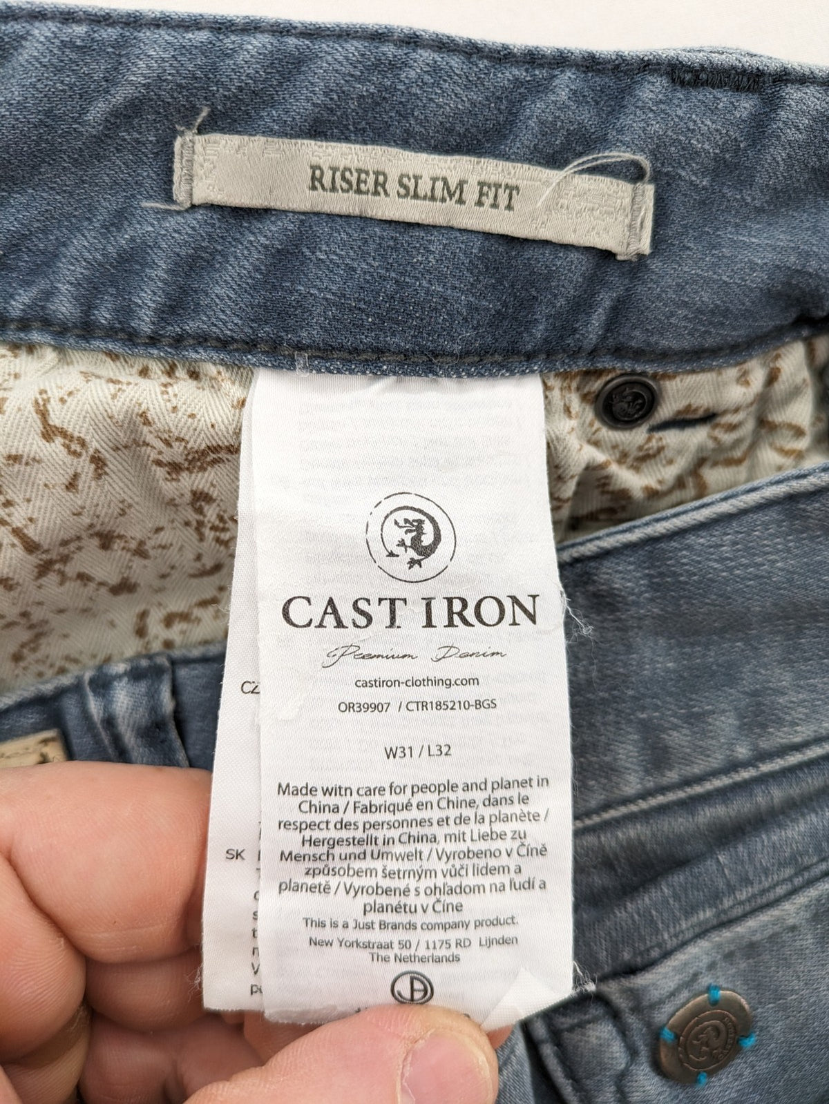 CAST IRON blue straight jeans Riser Slim Fit with classic button fly and casual wash.