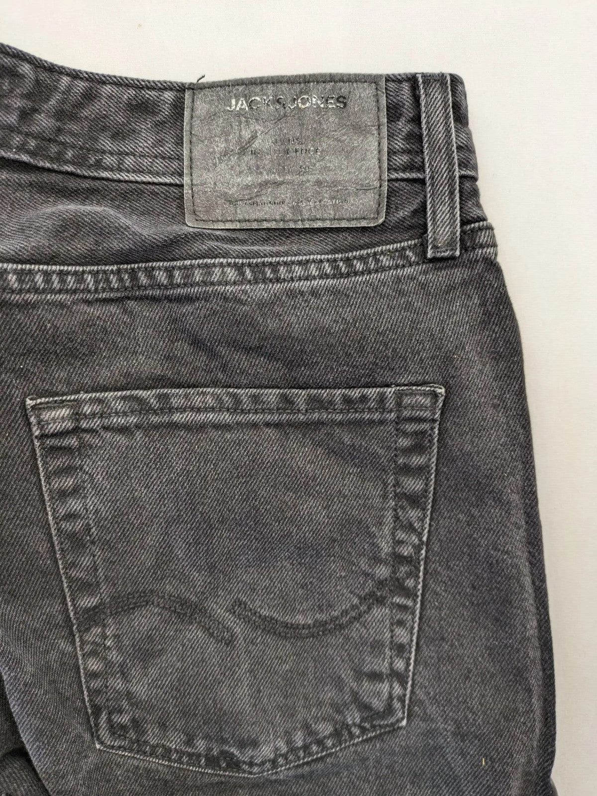 Jack & Jones grey loose fit jeans with classic button fly and 5-pocket design.