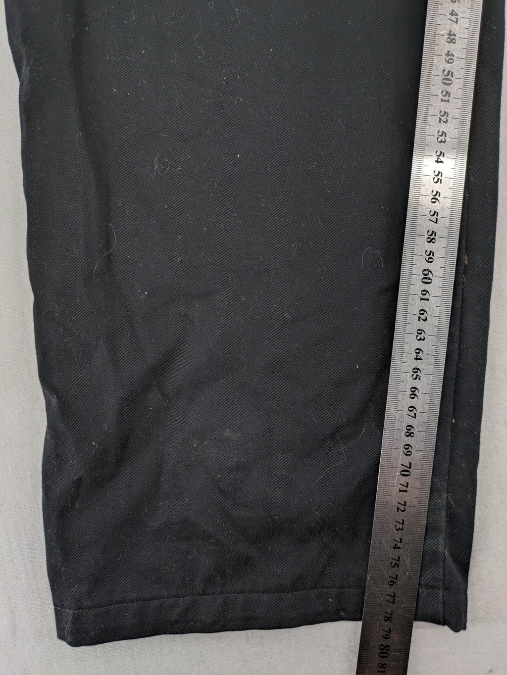 Travel Master black hunting and tactical pants, zip-off design, 100% cotton, multiple pockets.