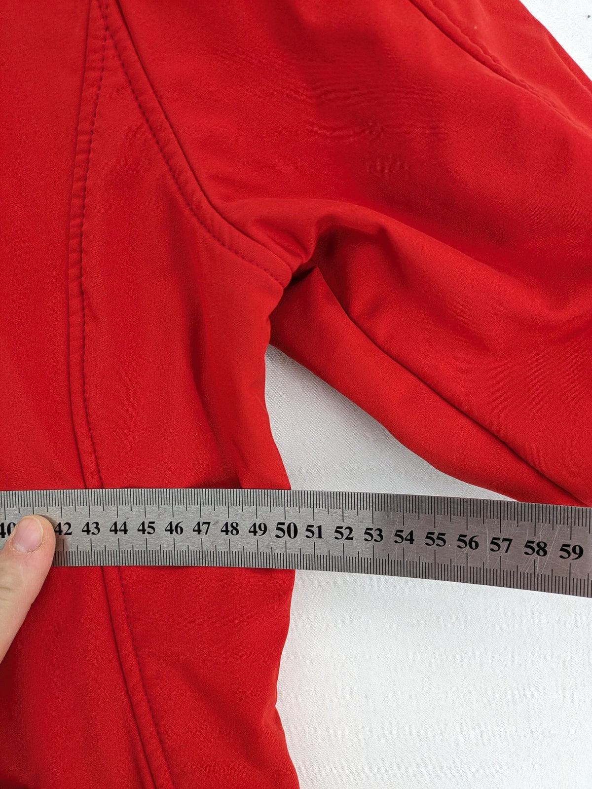 4F red softshell jacket with fleece lining and Aquatech 3000 logo detail.