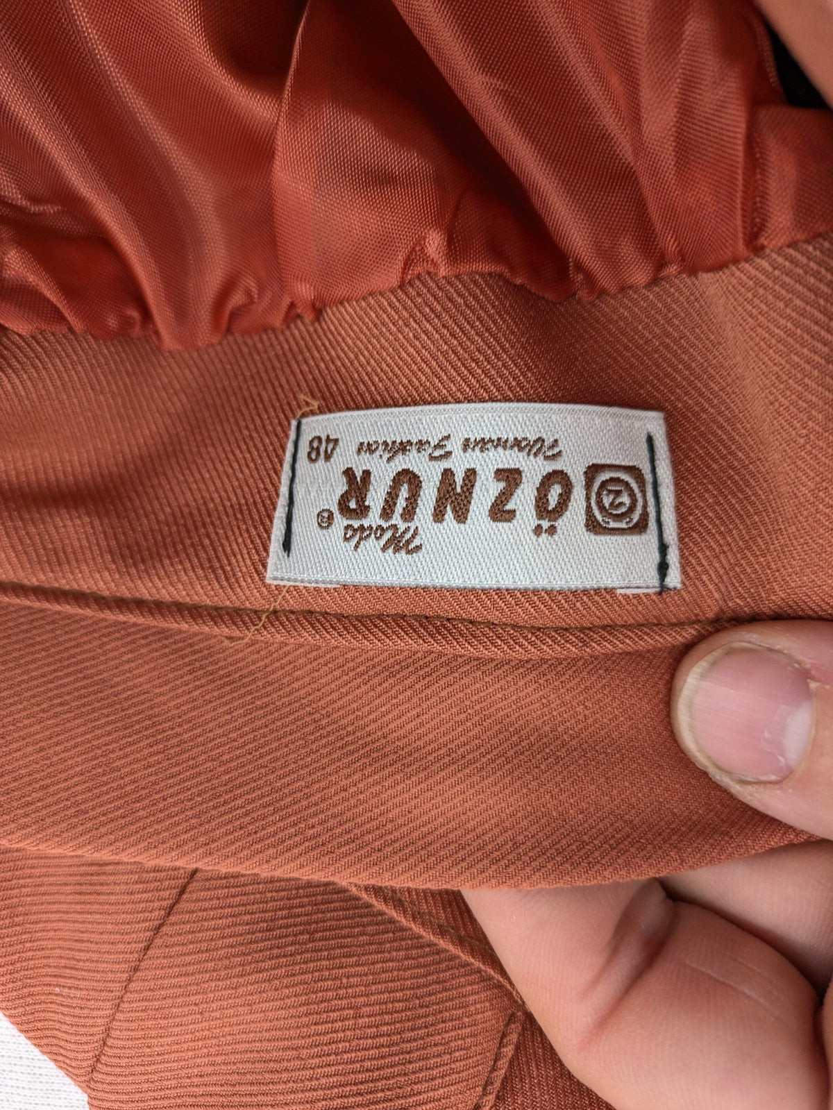 Moda orange long skirt A-line cut with front button placket and belt loops.