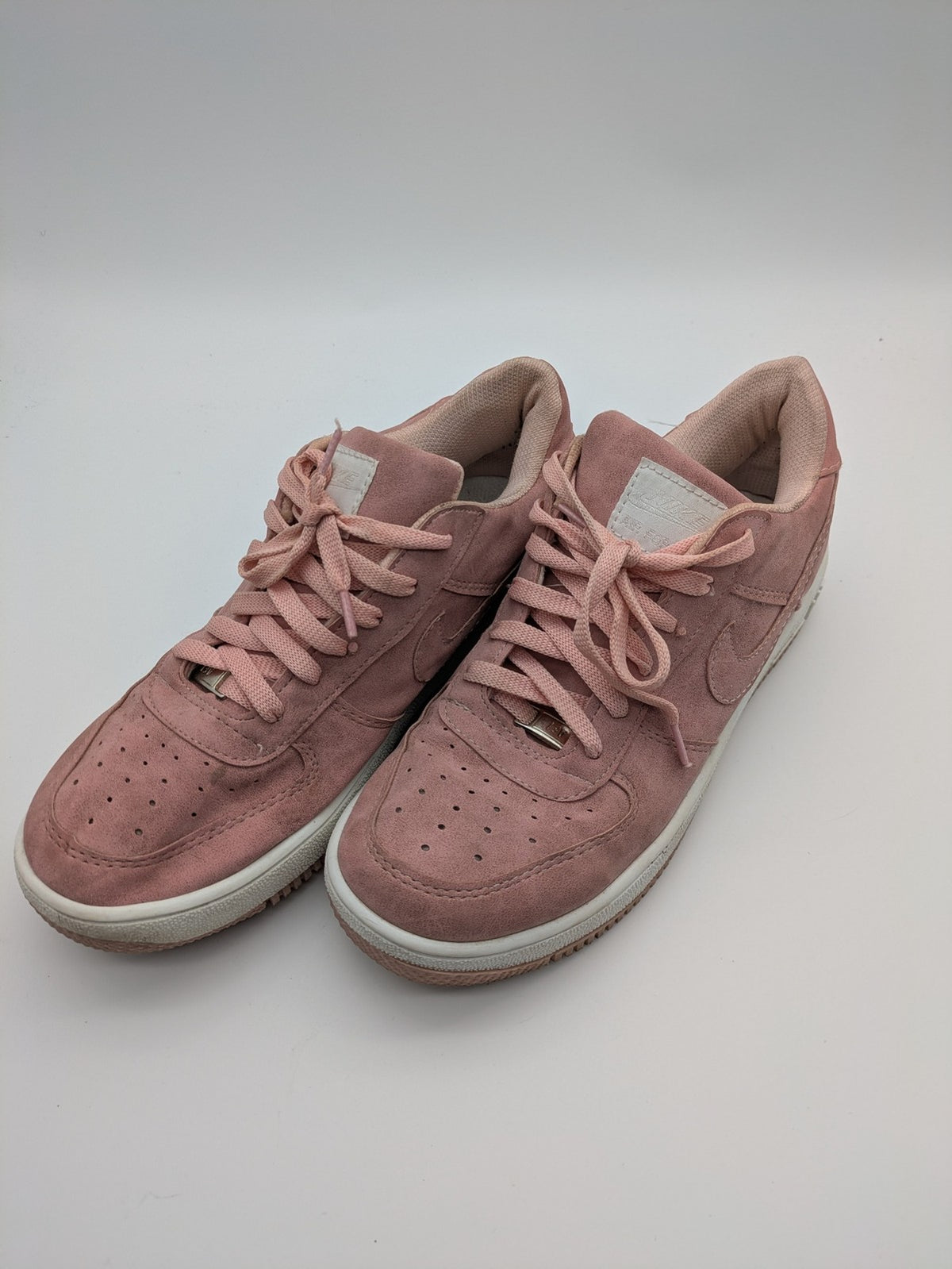 Nike Air Force 1 Low Top pink suede with perforated toe box and white sole