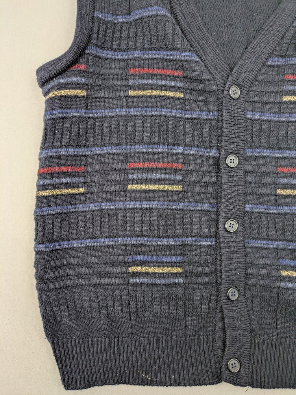 Via Cortesa gold turtle neck jumper with structured pattern and V-neck design.
