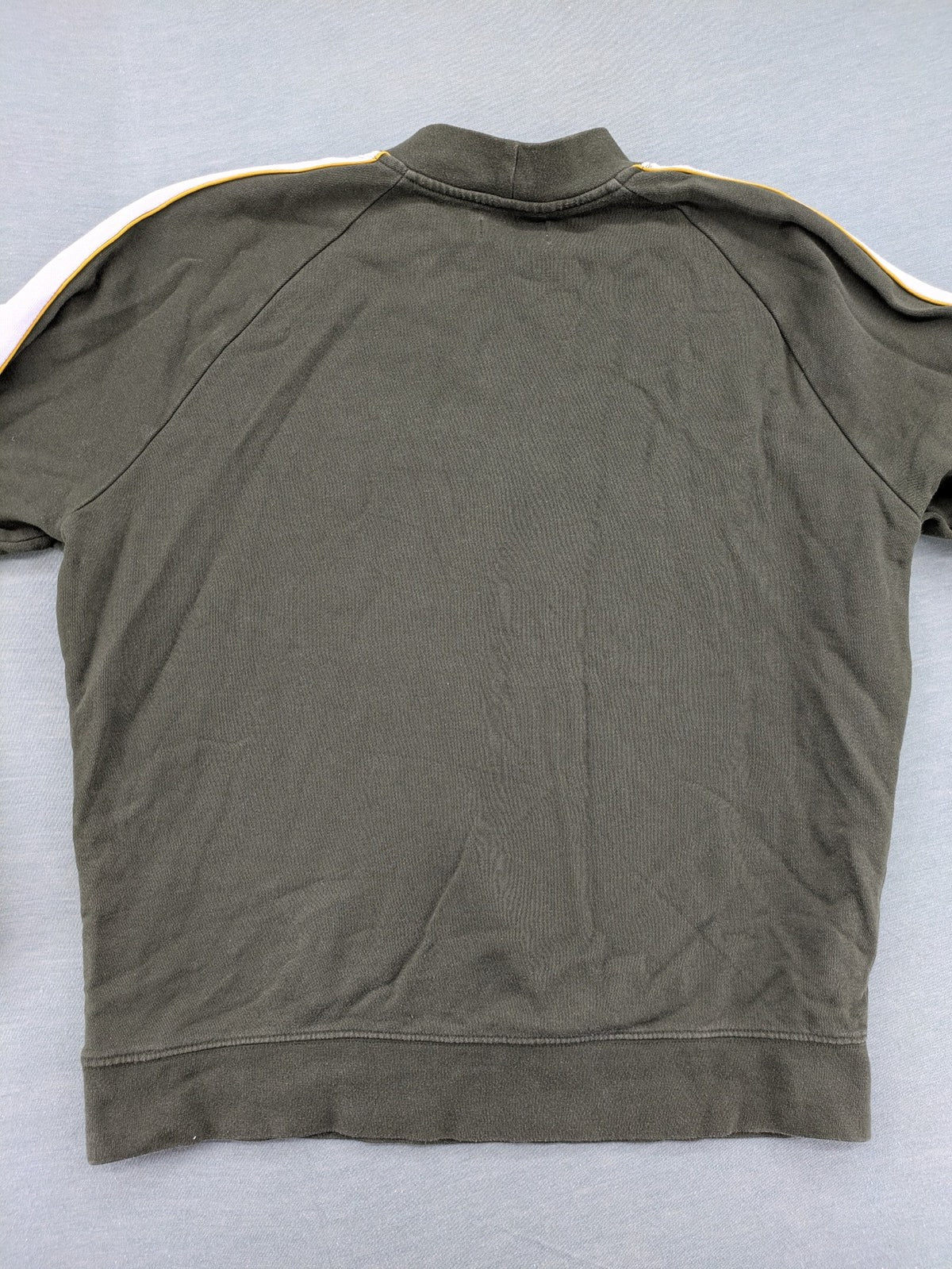Topman green turtle neck jumper with white colorblock and yellow piping, embroidered logo.