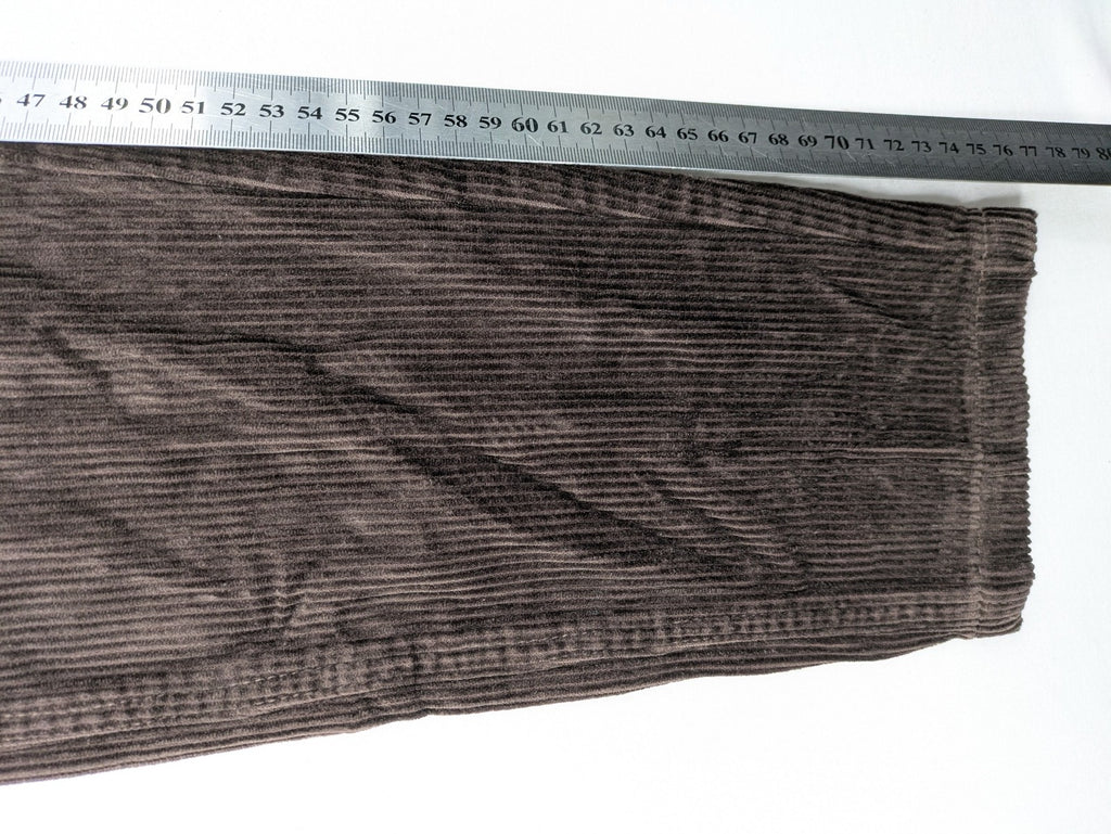 Alma & Lovis brown cord pants with drawstring, casual fit, and patch pockets.