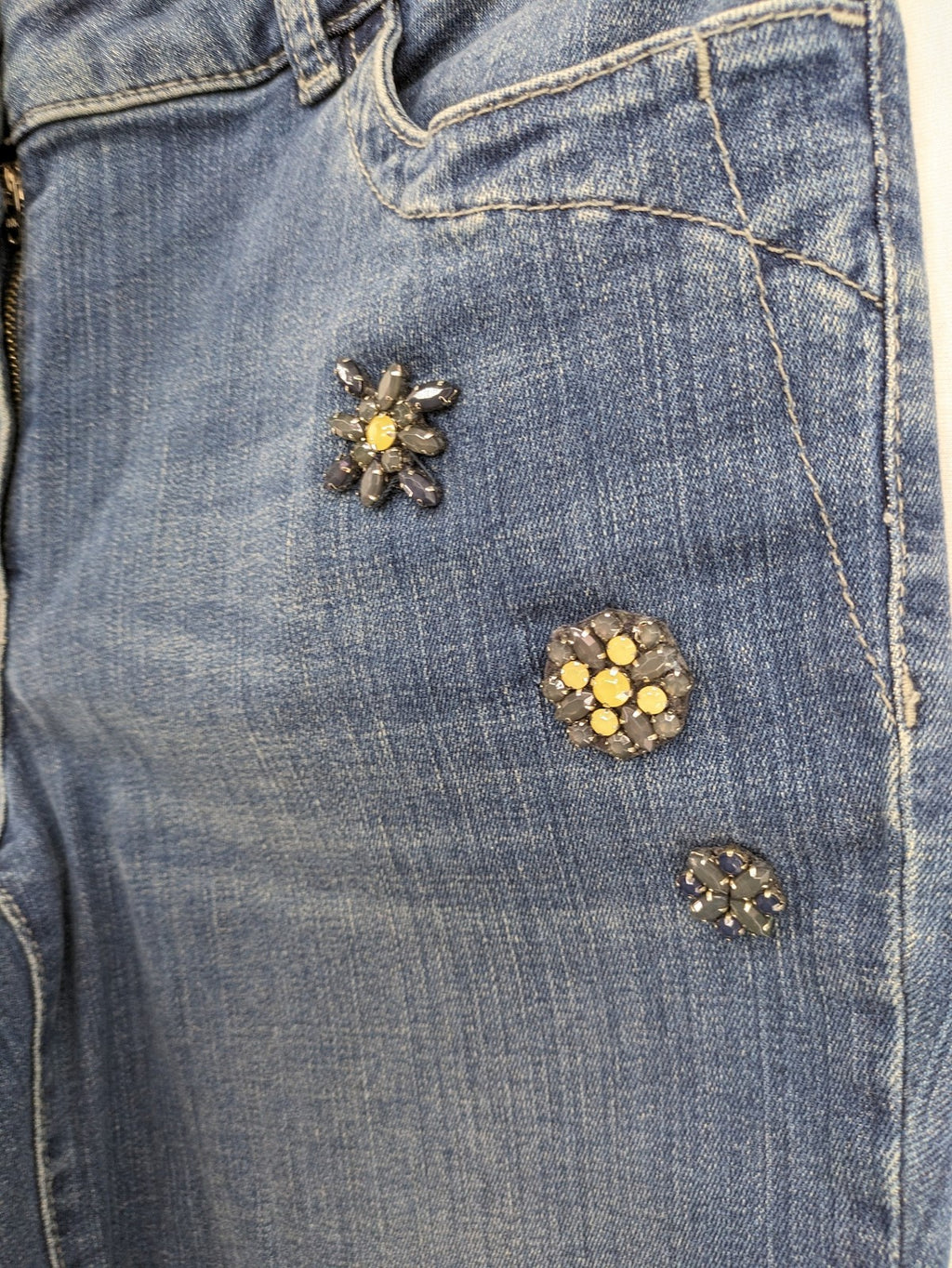 Gerry Weber blue straight jeans with decorative rhinestone appliqués and stretch denim material.