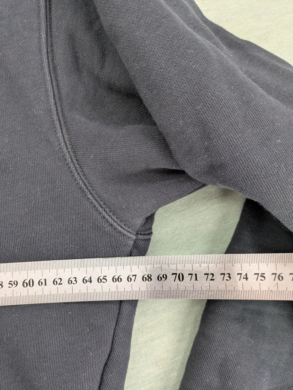 Lowlights Studios grey hoodie with embroidered logo and kangaroo pocket, 100% cotton.